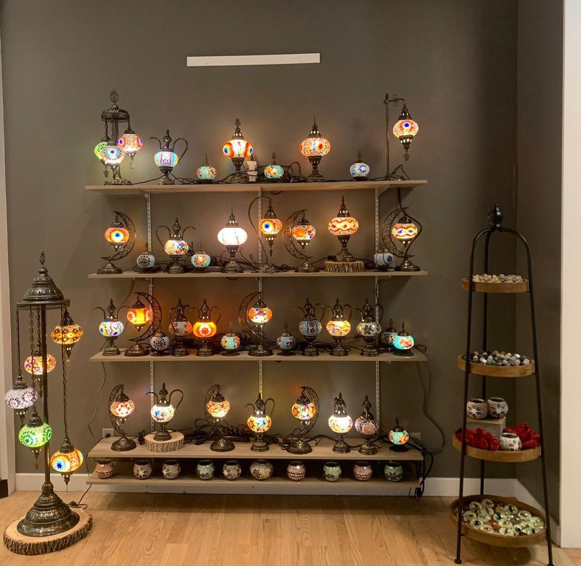 Turkish mosaic lamp collection on shelves